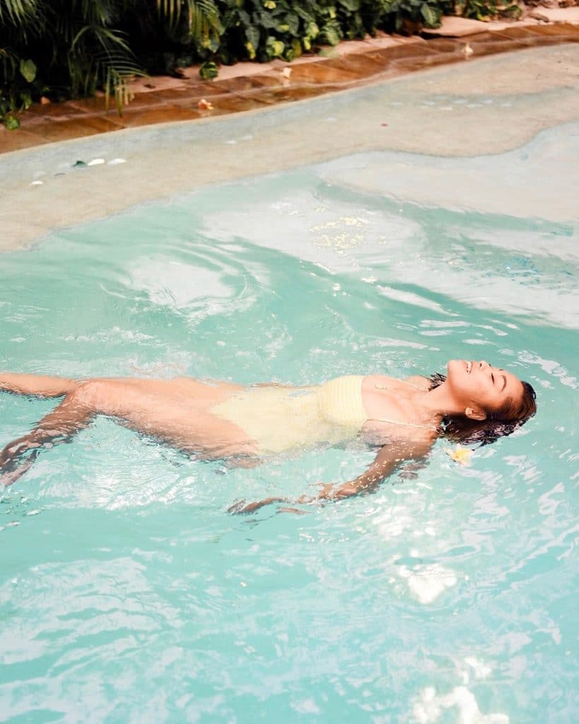 Lifestyle image woman in swimming pool