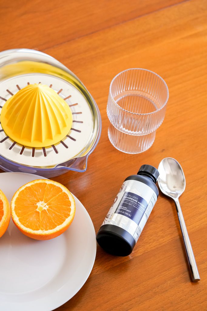 Membrane Mend Bottle with Oranges